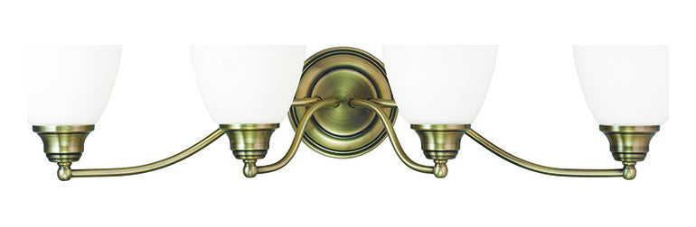 Antique Brass  4 Light Bathroom Vanity Light by Livex Lighting