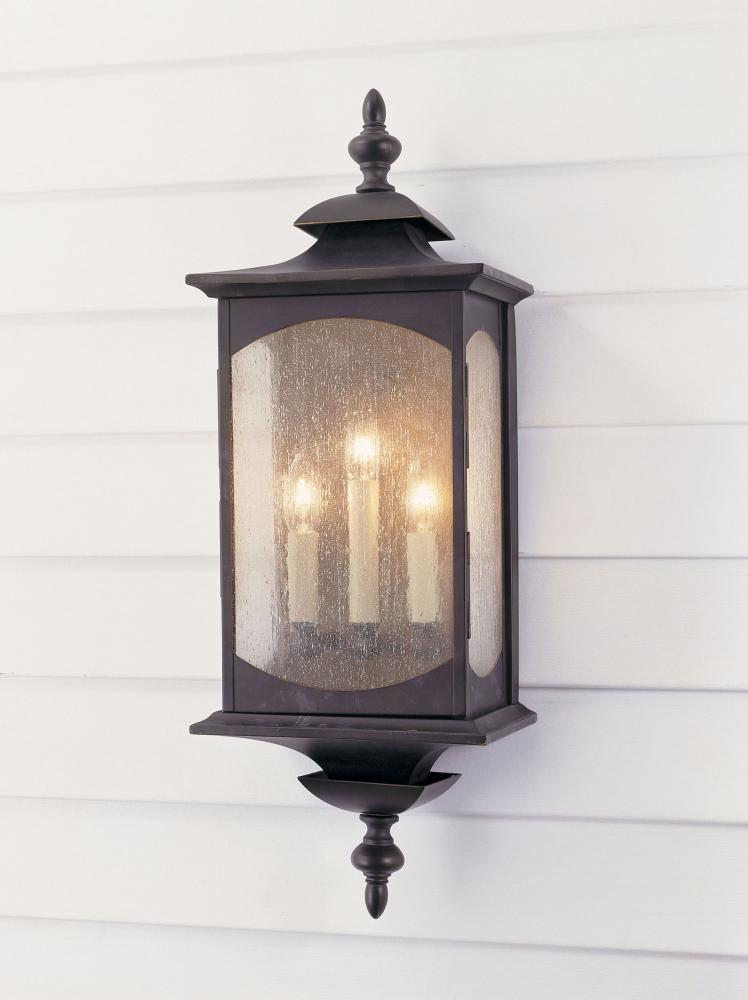 Three Light Oil Rubbed Bronze Clear Seeded Glass Wall Lantern by Generation Lighting