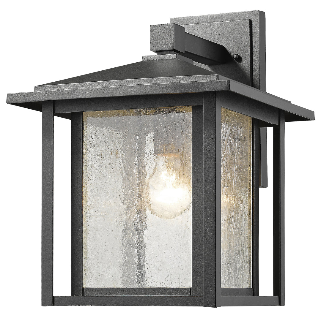 Black  Single Light 12in Wide Outdoor Wall Sconce with Seedy Glass Shade by Z-Lite