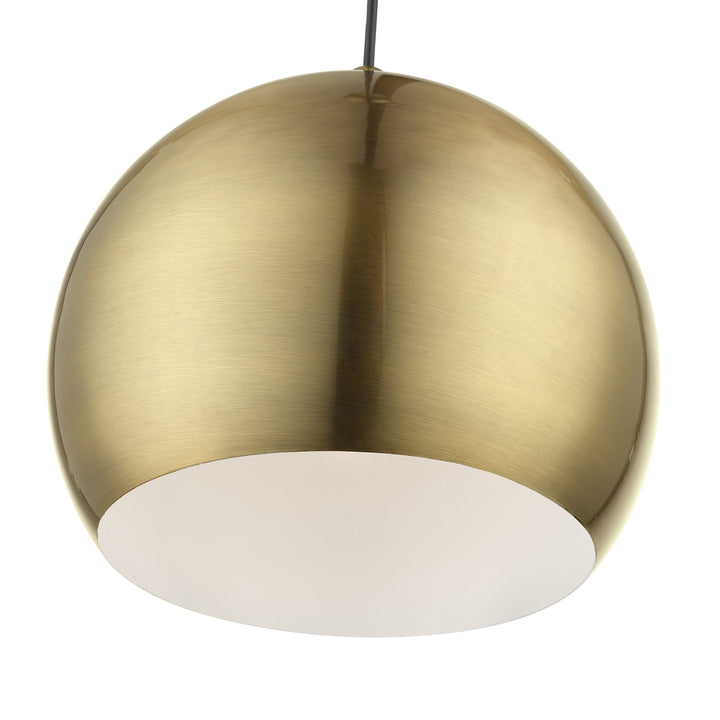 1 Light Antique Brass With Polished Brass Accents Globe Pendant