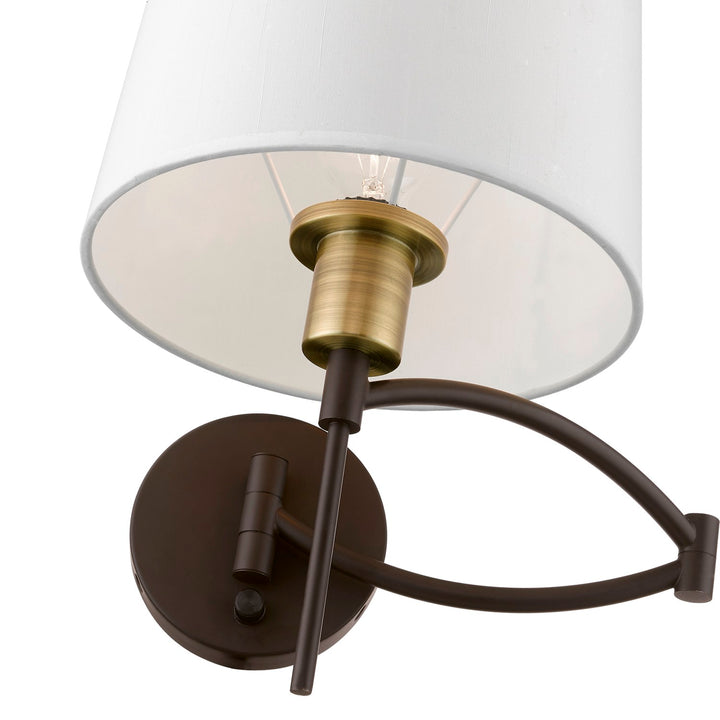 1 Light Bronze With Antique Brass Accent Swing Arm Wall Lamp