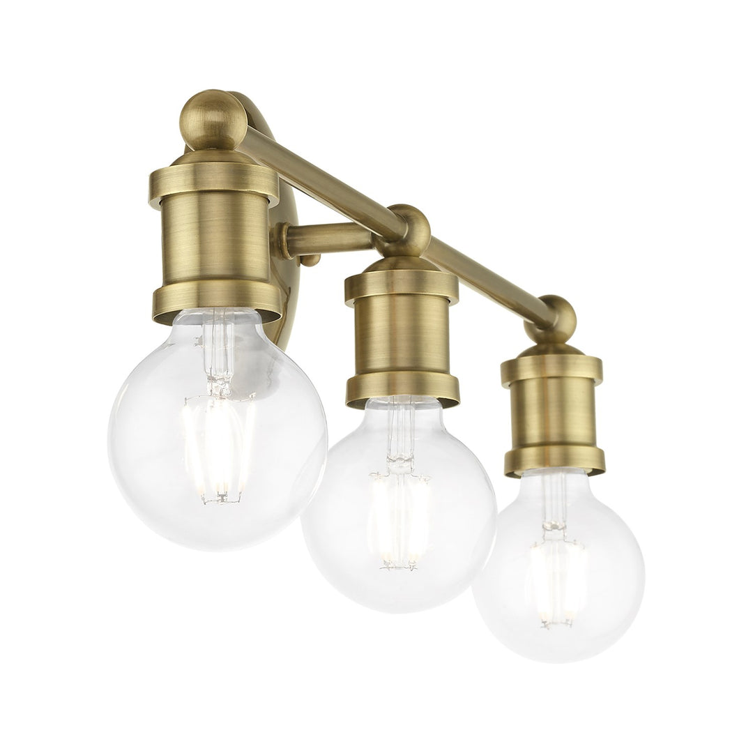 3 Light Antique Brass Ada Vanity Sconce