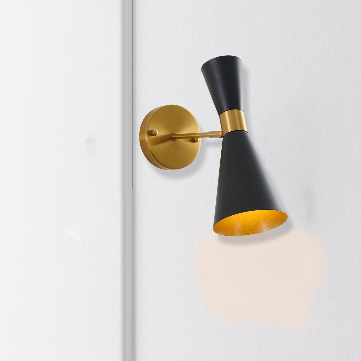 Wall Sconce In Black And Gold Finish by Bethel