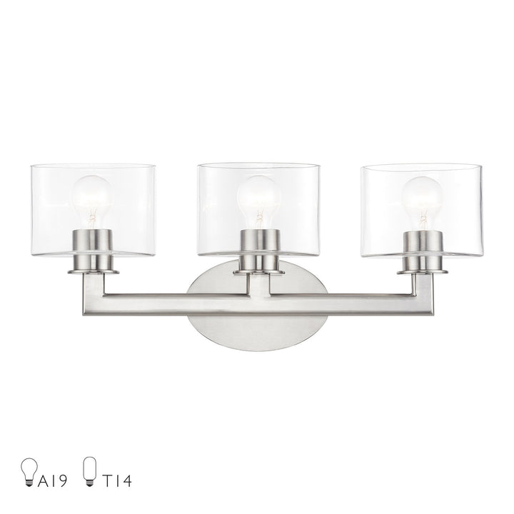 3 Light Brushed Nickel Vanity Sconce With Mouth Blown Clear Glass by Livex Lighting