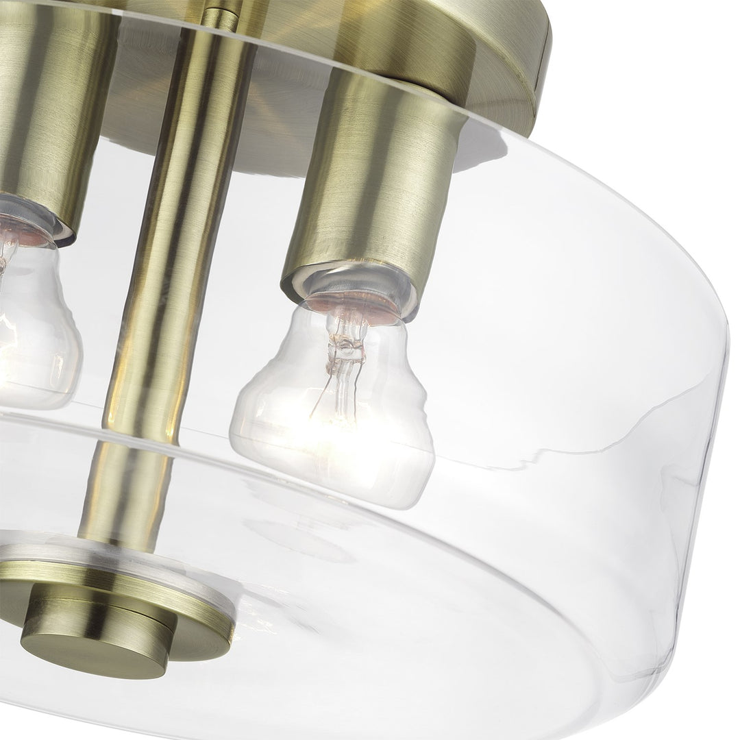 2 Light Antique Brass Medium Semi-Flush With Mouth Blown Clear Glass