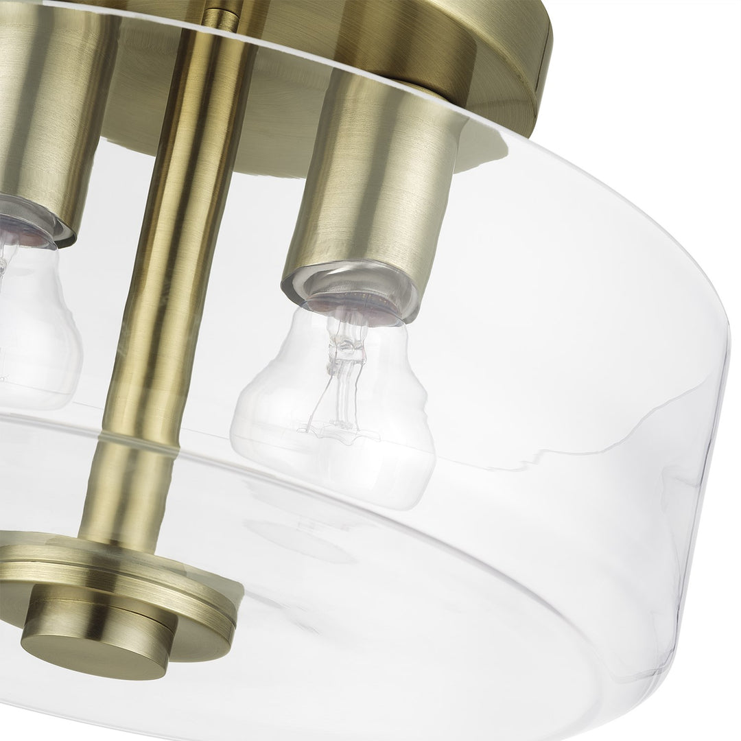 2 Light Antique Brass Medium Semi-Flush With Mouth Blown Clear Glass