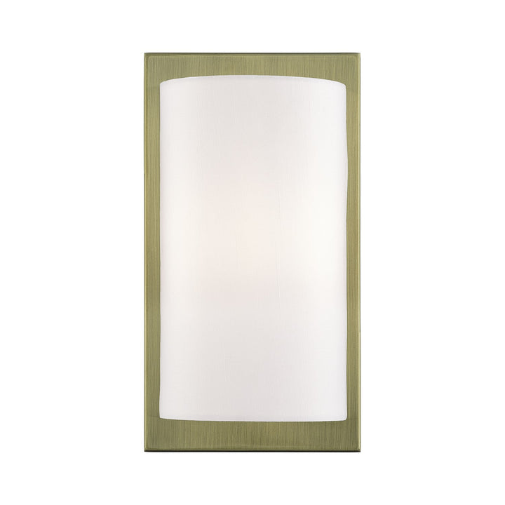 1 Light Antique Brass Ada Sconce With Hand Crafted Off-White Fabric Shade by Livex Lighting