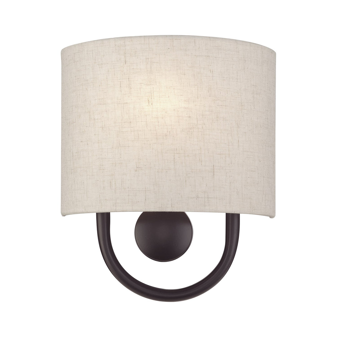 1 Light English Bronze Ada Sconce With Hand Crafted Oatmeal Fabric Shade by Livex Lighting