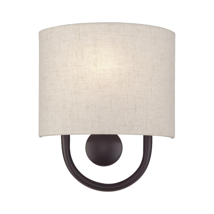 1 Light English Bronze Ada Sconce With Hand Crafted Oatmeal Fabric Shade by Livex Lighting
