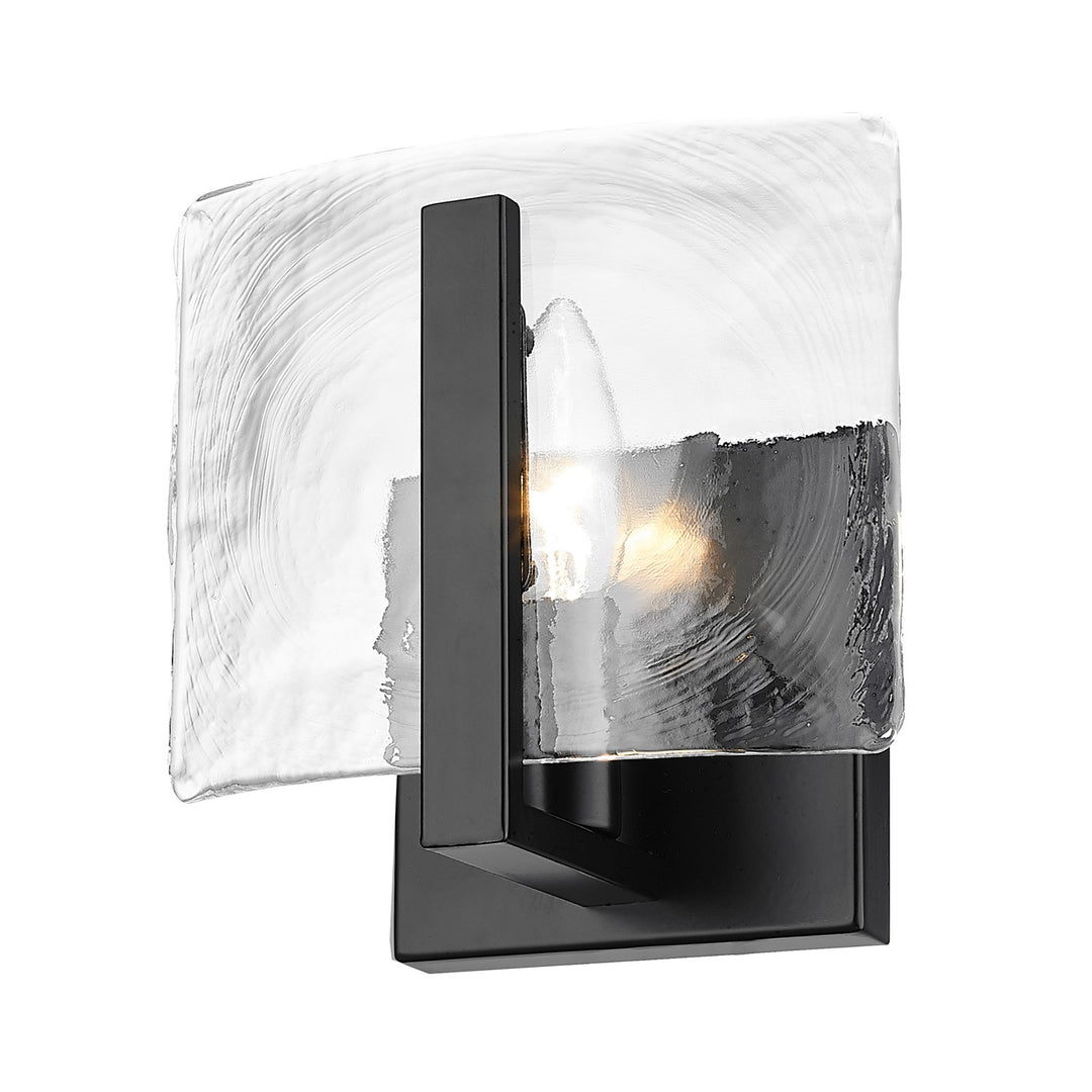 1 Light Wall Sconce In Matte Black With Hammered Water Glass Shade by Golden