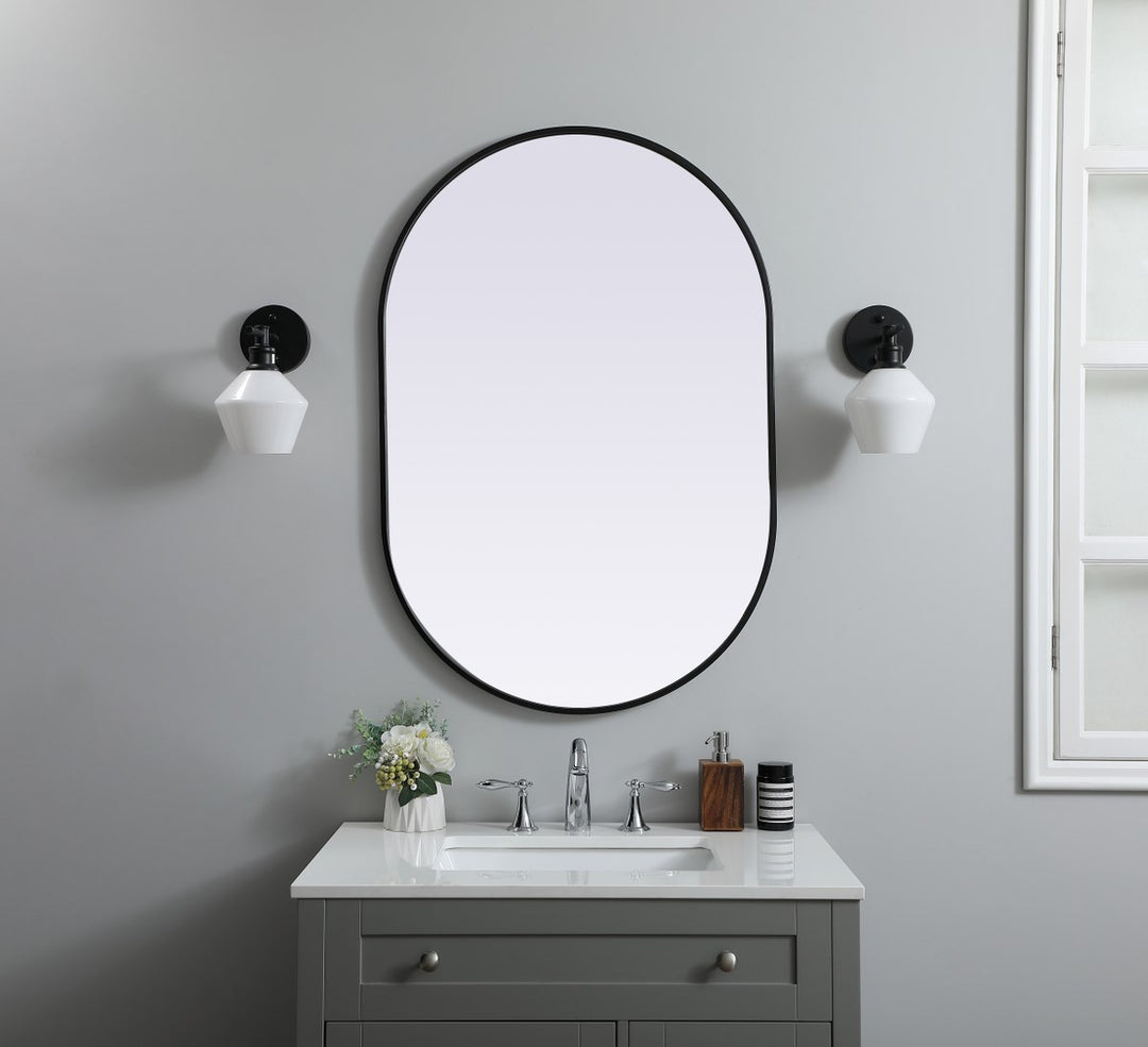 Metal Frame Oval Mirror 27X40 Inch In Black