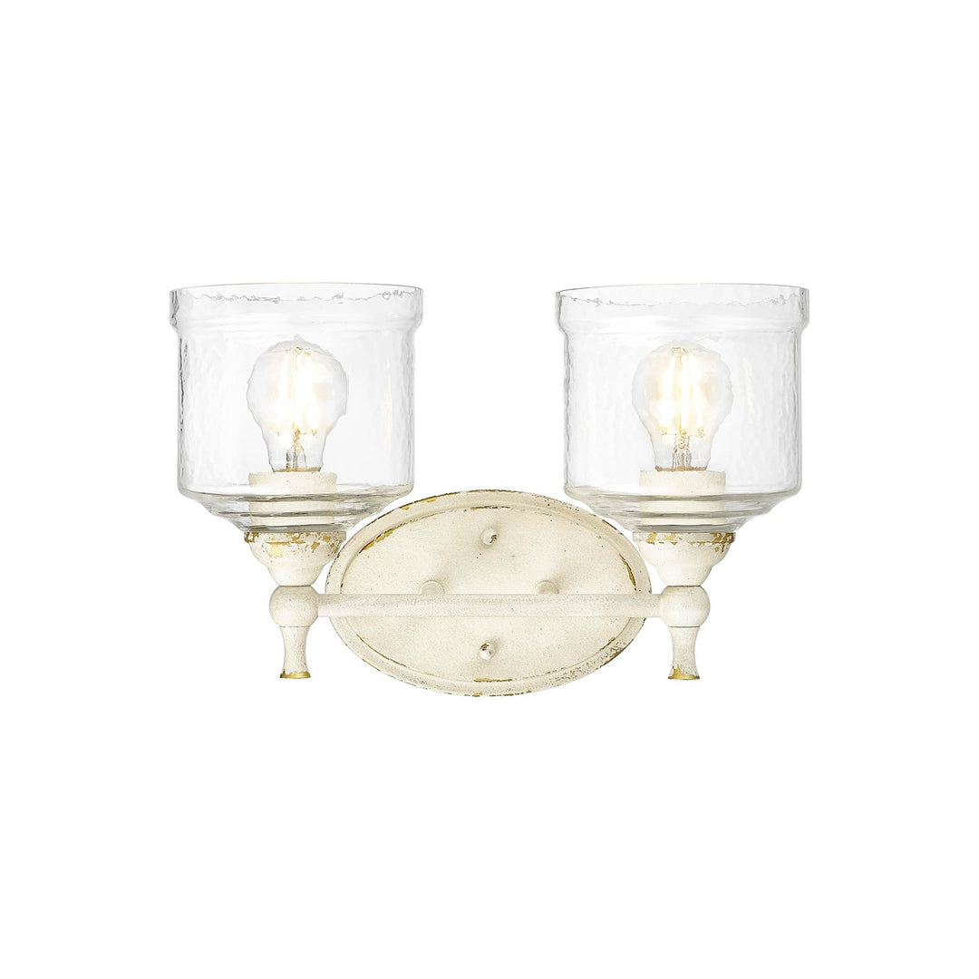 2 Light Bath Vanity In Antique Ivory With Hammered Water Glass Shade by Golden