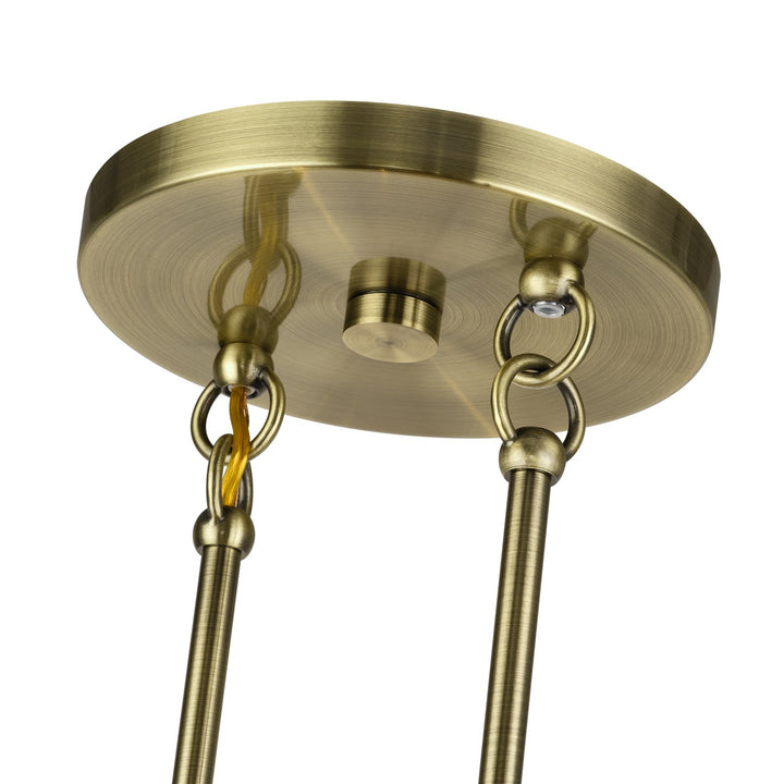 3 Light Antique Brass Medium Linear Chandelier