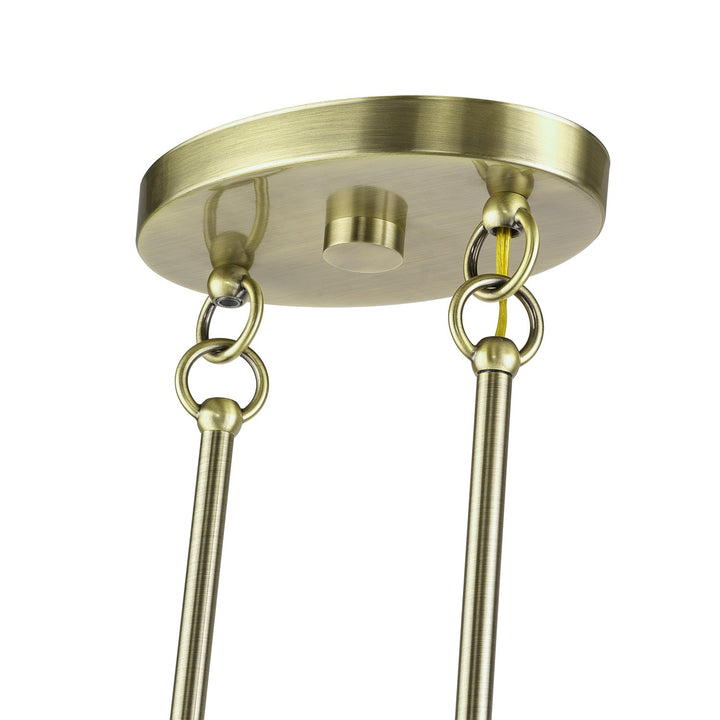3 Light Antique Brass Medium Linear Chandelier