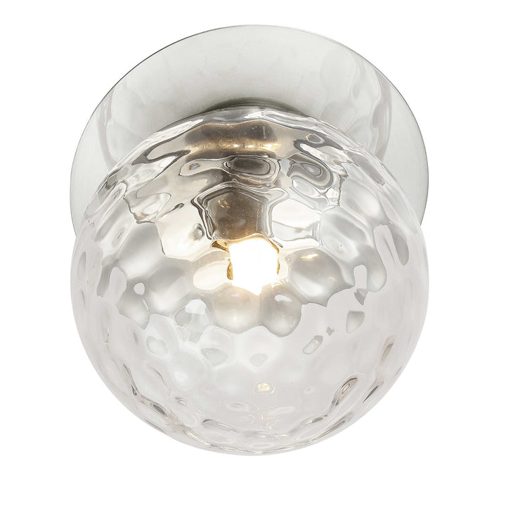 1 Light Polished Chrome Incandescent Wall Sconce With Hammered Glass Globe by Dainolite