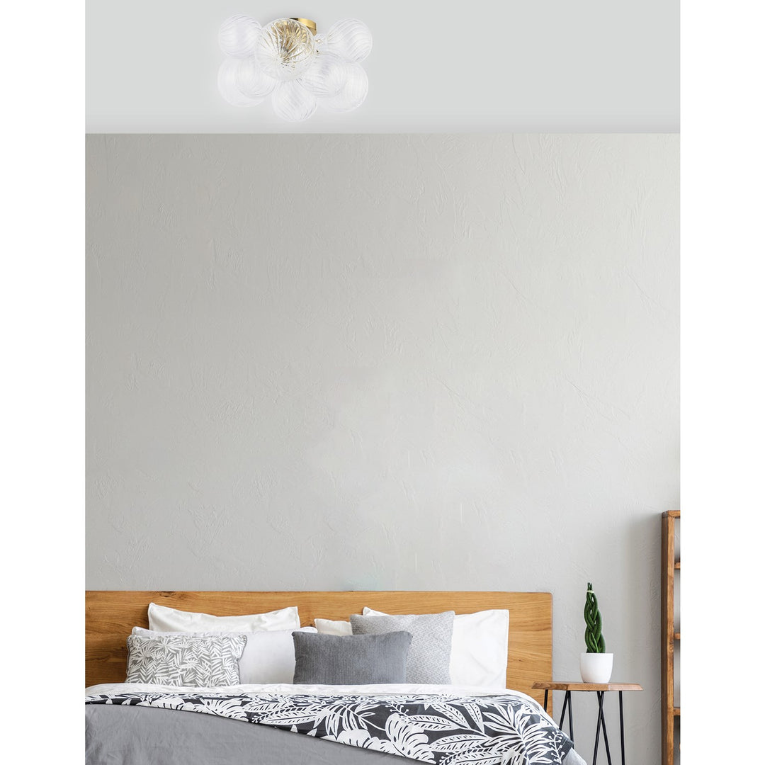 3 Light Flush Mount, Aged Brass W/ Clear Spiral Glass